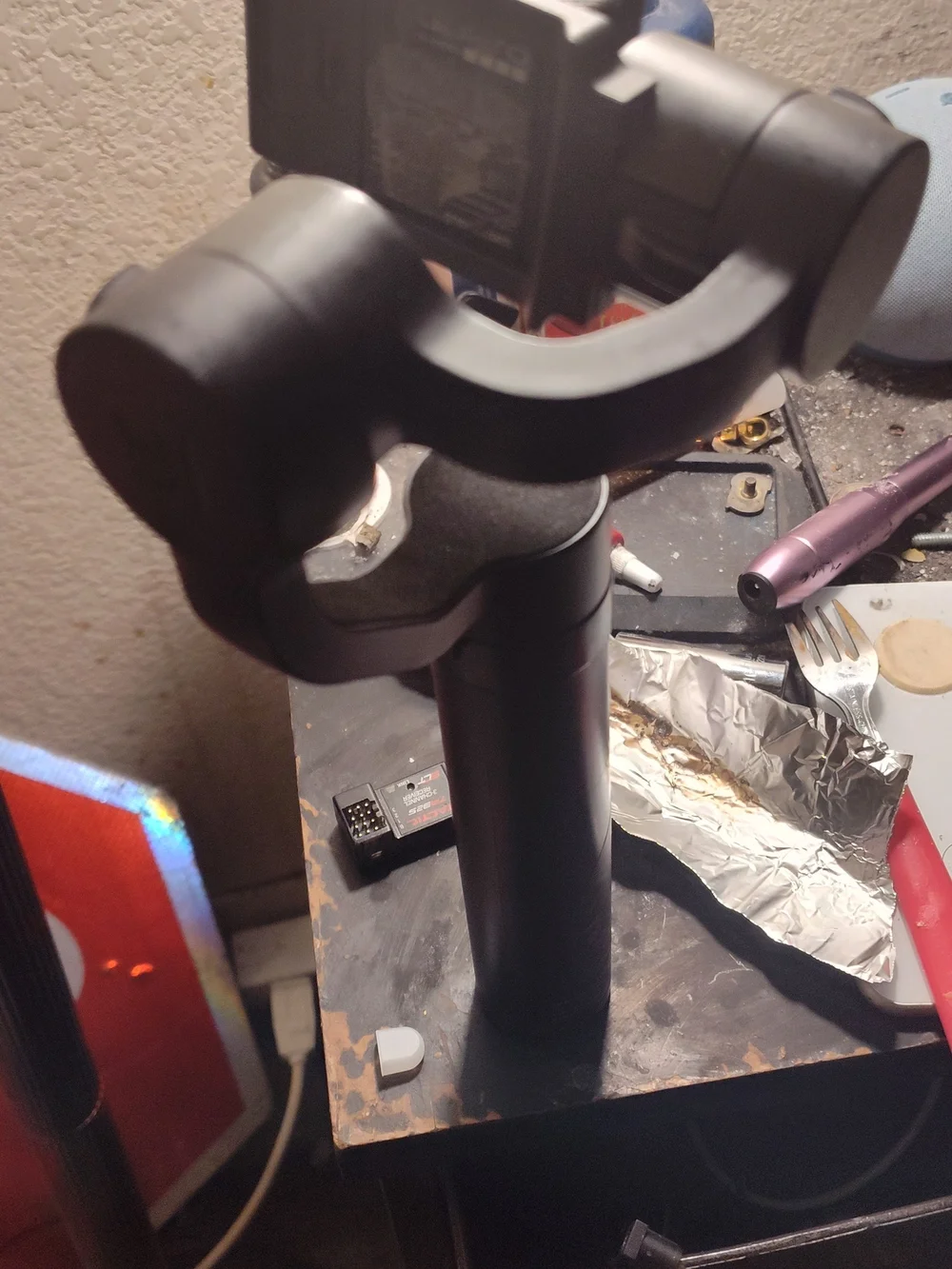 GoPro Silver and Black HERO3 on Yi Black Handheld Gimbal
